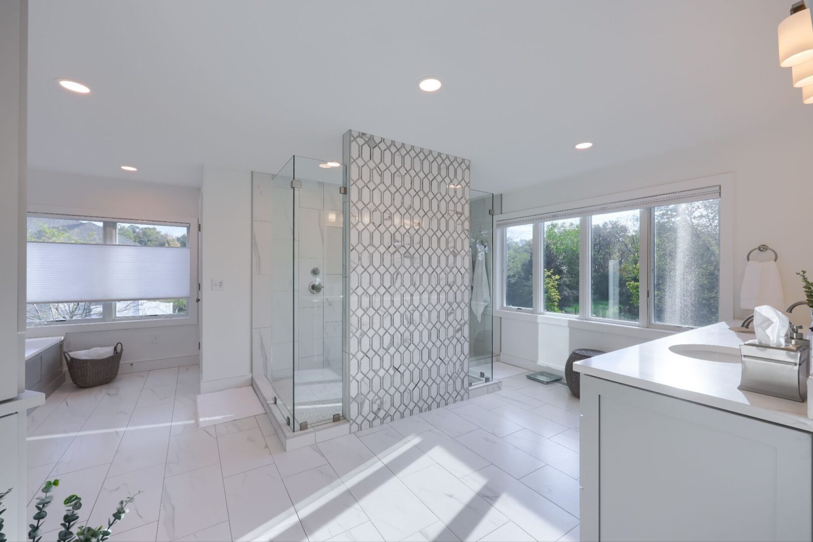 a spacious, white remodeled bathroom.